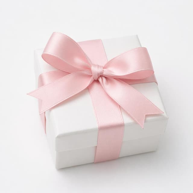 A small elegant white gift box with a pale pink satin ribbon tied in a neat bow, on a plain white surface
Chat attachment instruction: Generate exactly one in-world chat attachment, not a collage, split-screen, comic panel, flashback, or explanatory scene. If the prompt is a screenshot, phone screen, document, note, card, map, receipt, label, object photo, or photo someone took, frame that artifact directly. A name appearing in visible text or in 'photo taken by X' is not an instruction to draw that person. Do not show recurring story participants as visible people unless the prompt itself explicitly says they are visible. Keep unrequested people, faces, and bodies out of the image.