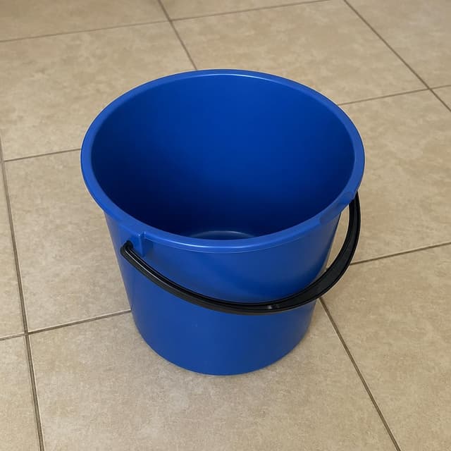 A single empty plastic bucket on a tiled floor
Chat attachment instruction: Generate exactly one in-world chat attachment, not a collage, split-screen, comic panel, flashback, or explanatory scene. If the prompt is a screenshot, phone screen, document, note, card, map, receipt, label, object photo, or photo someone took, frame that artifact directly. A name appearing in visible text or in 'photo taken by X' is not an instruction to draw that person. Do not show recurring story participants as visible people unless the prompt itself explicitly says they are visible. Keep unrequested people, faces, and bodies out of the image.