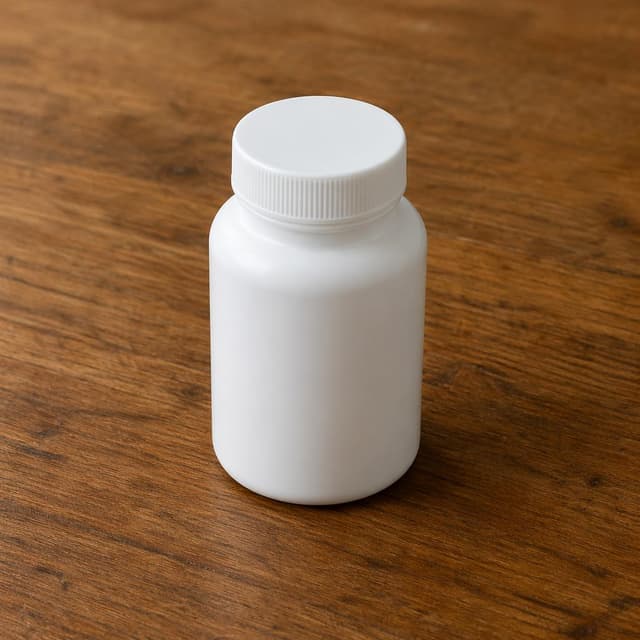 A plain white plastic bottle with a blank, unlabeled cap on a bare wooden table
Chat attachment instruction: Generate exactly one in-world chat attachment, not a collage, split-screen, comic panel, flashback, or explanatory scene. If the prompt is a screenshot, phone screen, document, note, card, map, receipt, label, object photo, or photo someone took, frame that artifact directly. A name appearing in visible text or in 'photo taken by X' is not an instruction to draw that person. Do not show recurring story participants as visible people unless the prompt itself explicitly says they are visible. Keep unrequested people, faces, and bodies out of the image.