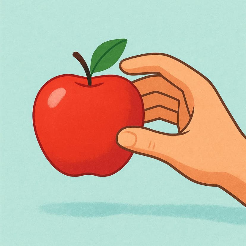 Eine einzelne menschliche Hand greift nach einem leuchtend roten Apfel, der auf einer ebenen Fläche liegt, bereit, ihn zu ergreifen.