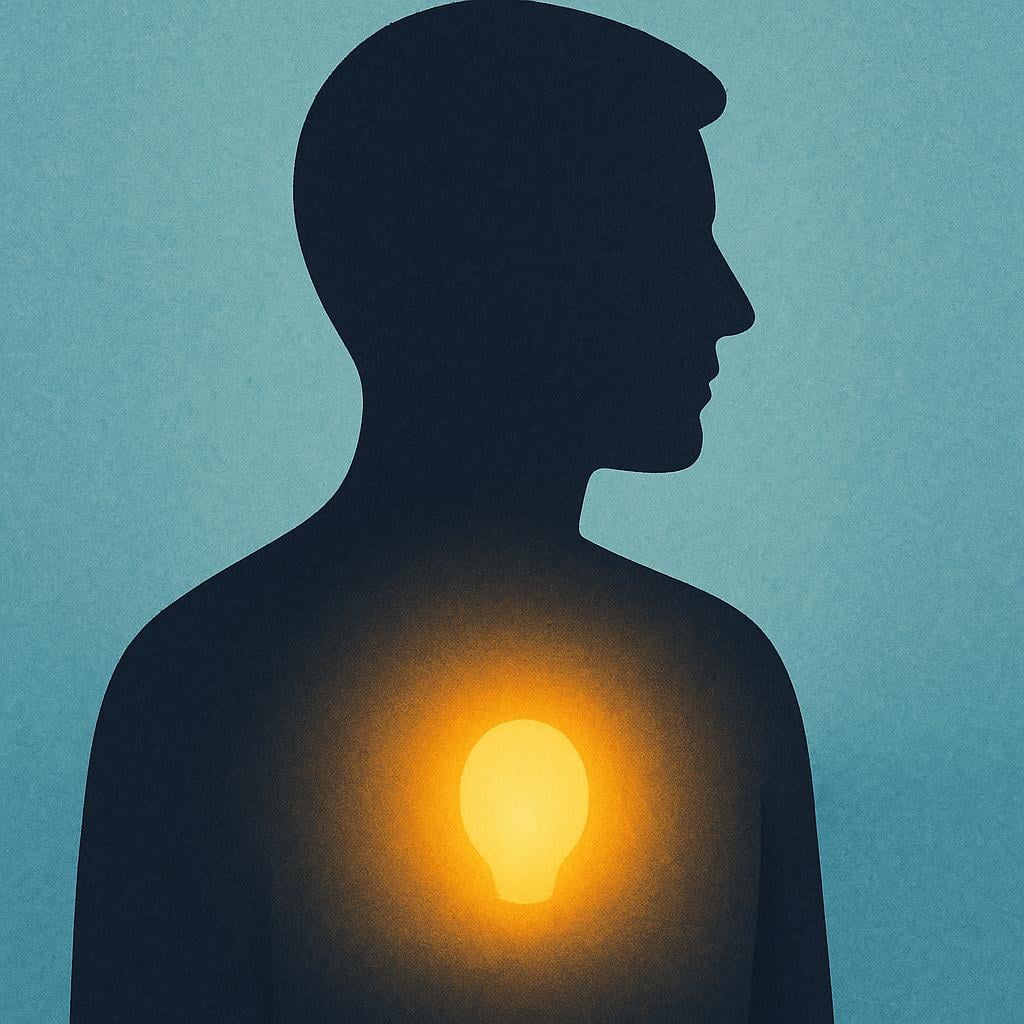 A simple silhouette of a human head and shoulders, shown in profile. Inside the chest cavity, a brightly glowing, warm yellow light source is visible, symbolizing the inner self.
