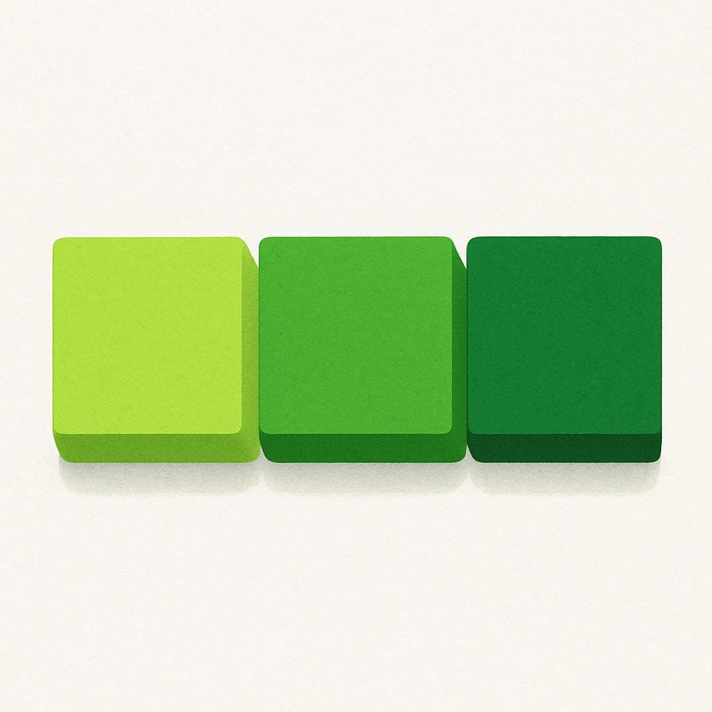 Three adjacent square blocks showing distinct, gradually deepening shades of the color green, ranging from light lime green to deep forest green.