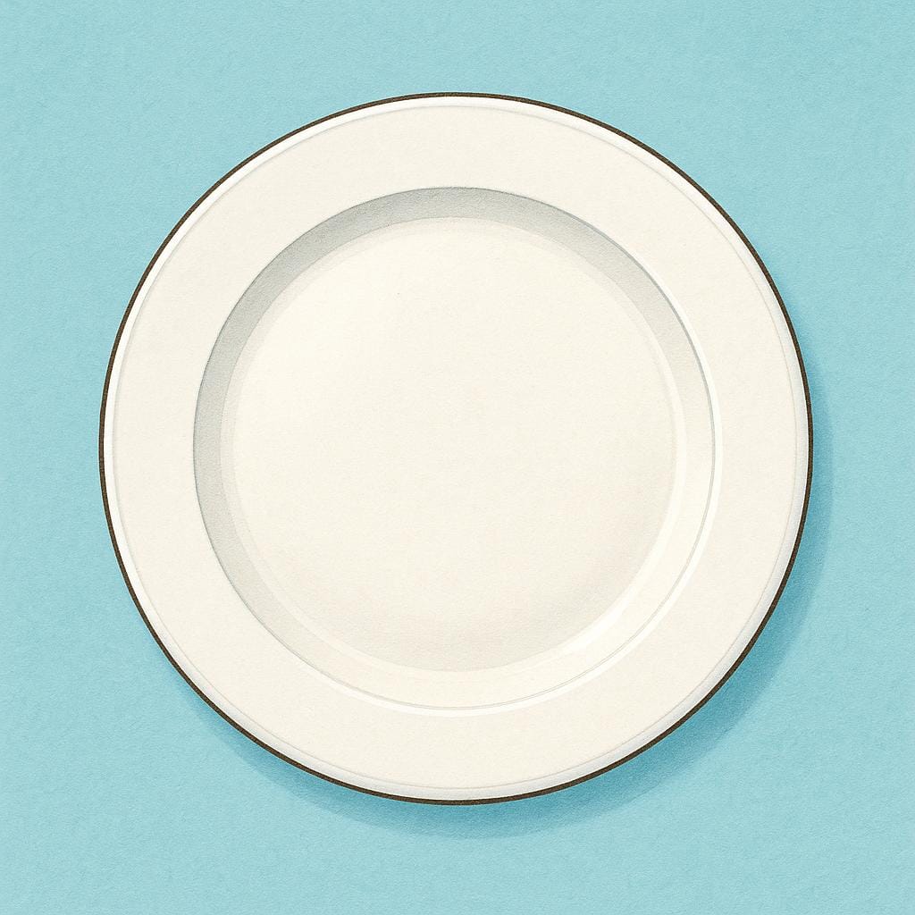 A single, empty, white ceramic dinner plate resting on a surface.
