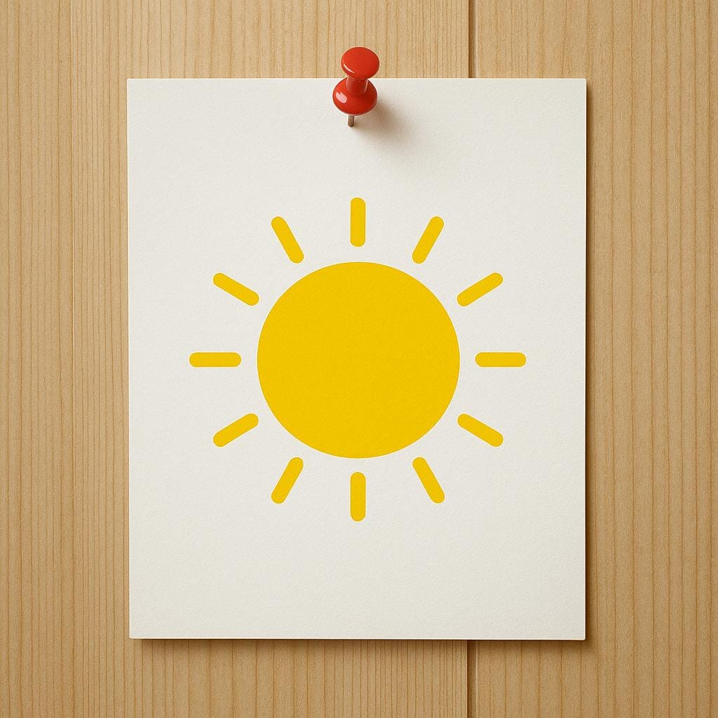 A large, colorful poster depicting a simple illustration of a bright yellow sun, tacked onto a plain wooden wall.