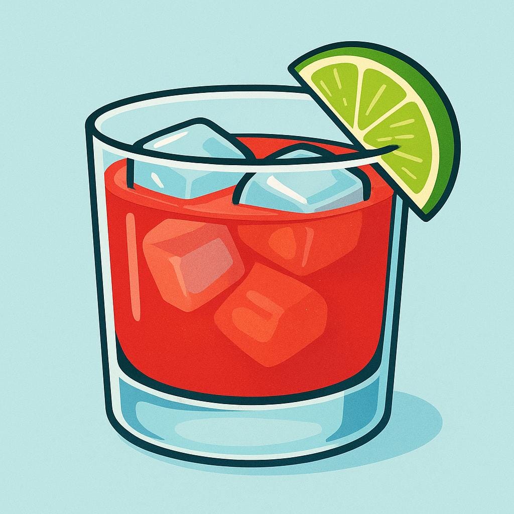 A vibrant red cocktail with a lime wedge garnish sitting in a short glass, implying an alcoholic beverage.