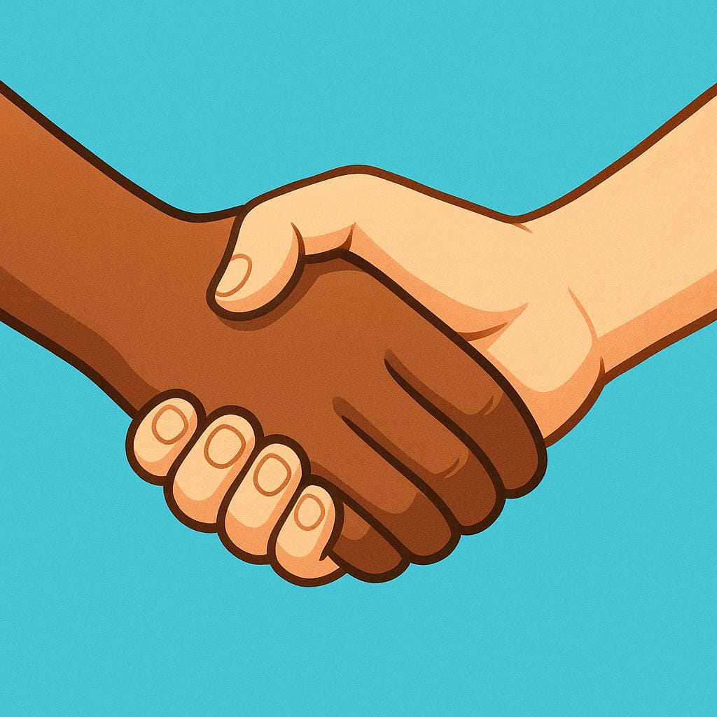 A close-up view of two diverse human hands firmly clasped together in a handshake, symbolizing agreement and unity.