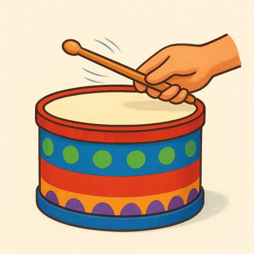 A close-up view of a hand holding a drumstick striking the surface of a vibrant, colorful drum.