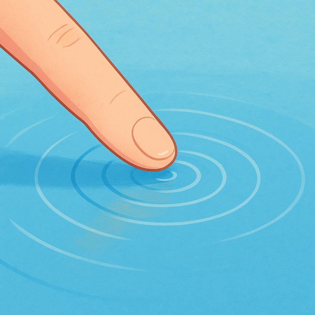 A close-up of a finger gently touching the surface of a calm pond, creating small ripples.