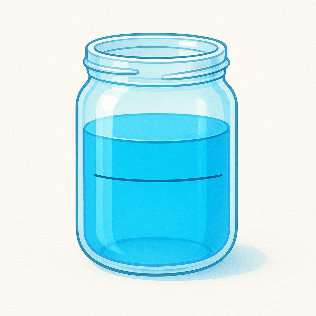 A clear glass jar filled with blue liquid that reaches exactly up to a distinct horizontal limit line marked near the top of the jar.