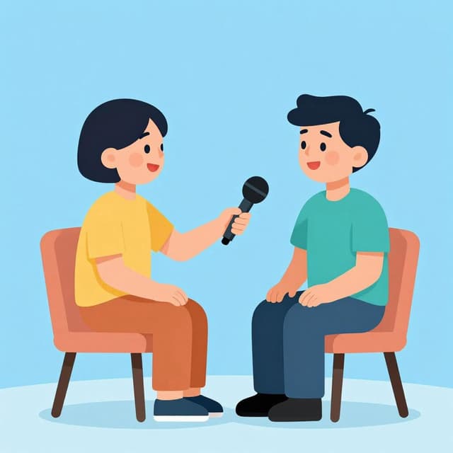 Eine Person hält ein Mikrofon auf eine andere Person, die spricht, beide sitzen in bequemen Stühlen.