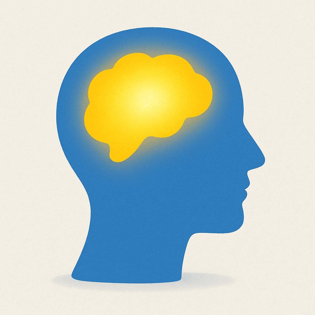 A simple blue silhouette of a human head shown in profile. Inside the head, a bright yellow abstract shape glows brightly, representing mental activity or thought.