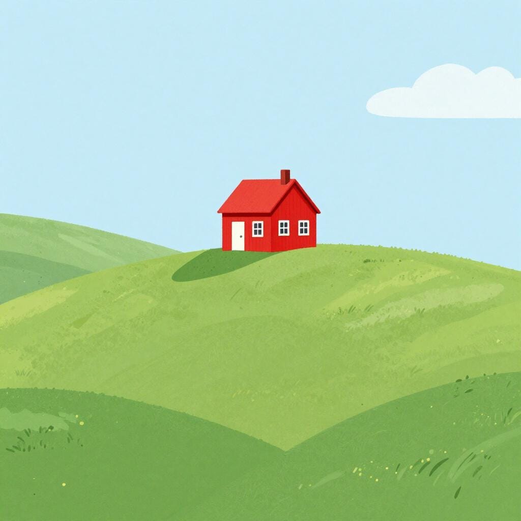 A small red house sitting alone on top of a grassy green hill under a clear blue sky.