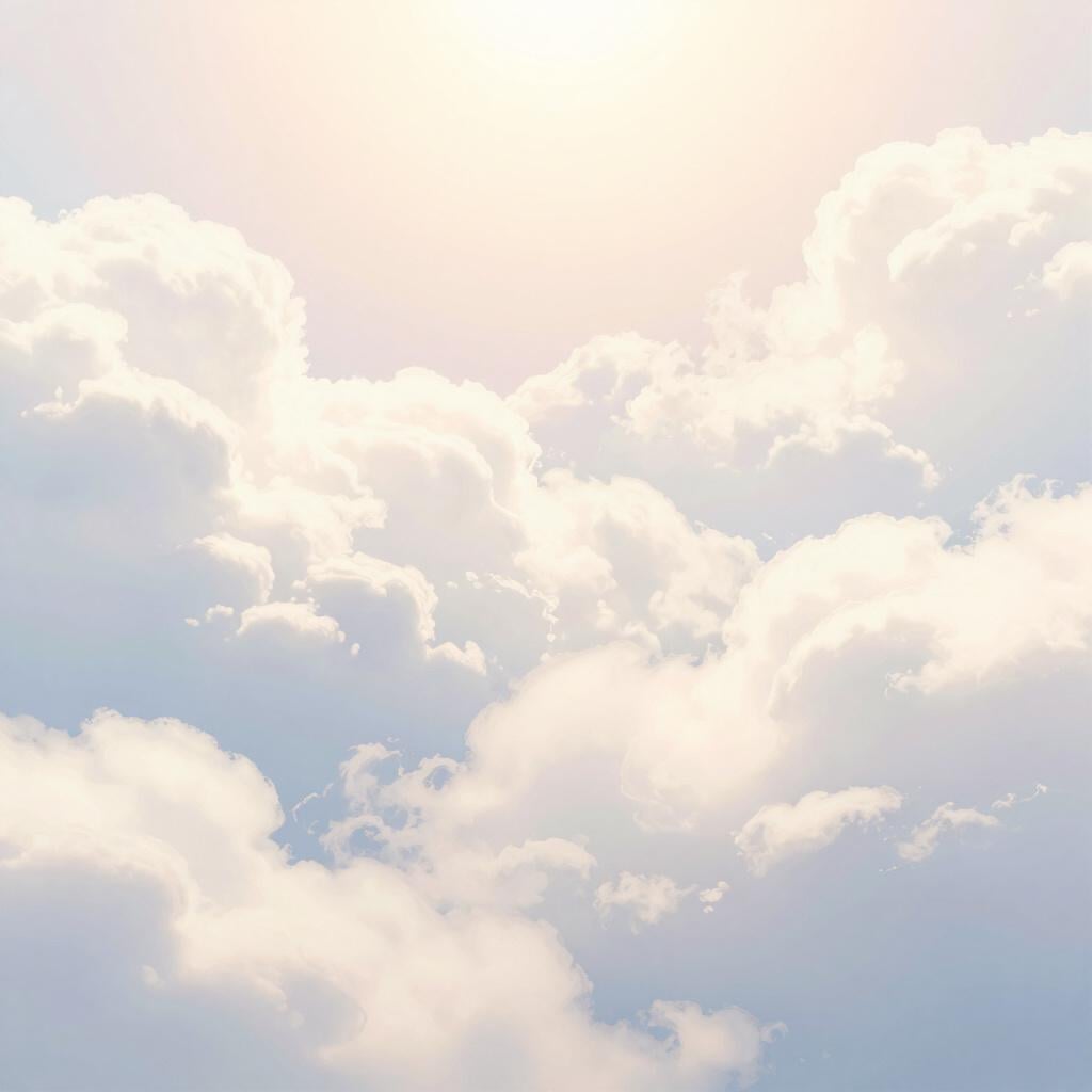 Un ciel serein rempli de nuages doux, blancs et pastel et une lumière douce et radieuse, représentant le ciel.