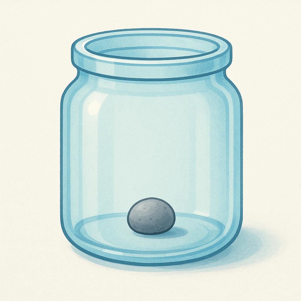 A transparent glass jar shown in cross-section with a single pebble resting on the very bottom.