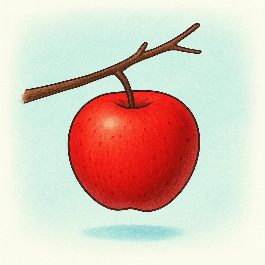 A ripe red apple hanging by its stem from a thin branch against a blue sky.