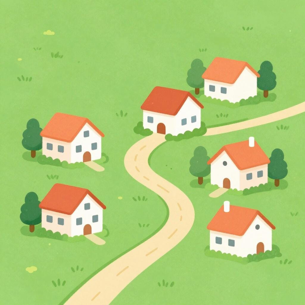 緑豊かな谷間に、赤い屋根と石畳の小道を持つカラフルな家々が集まっている小さな集落。