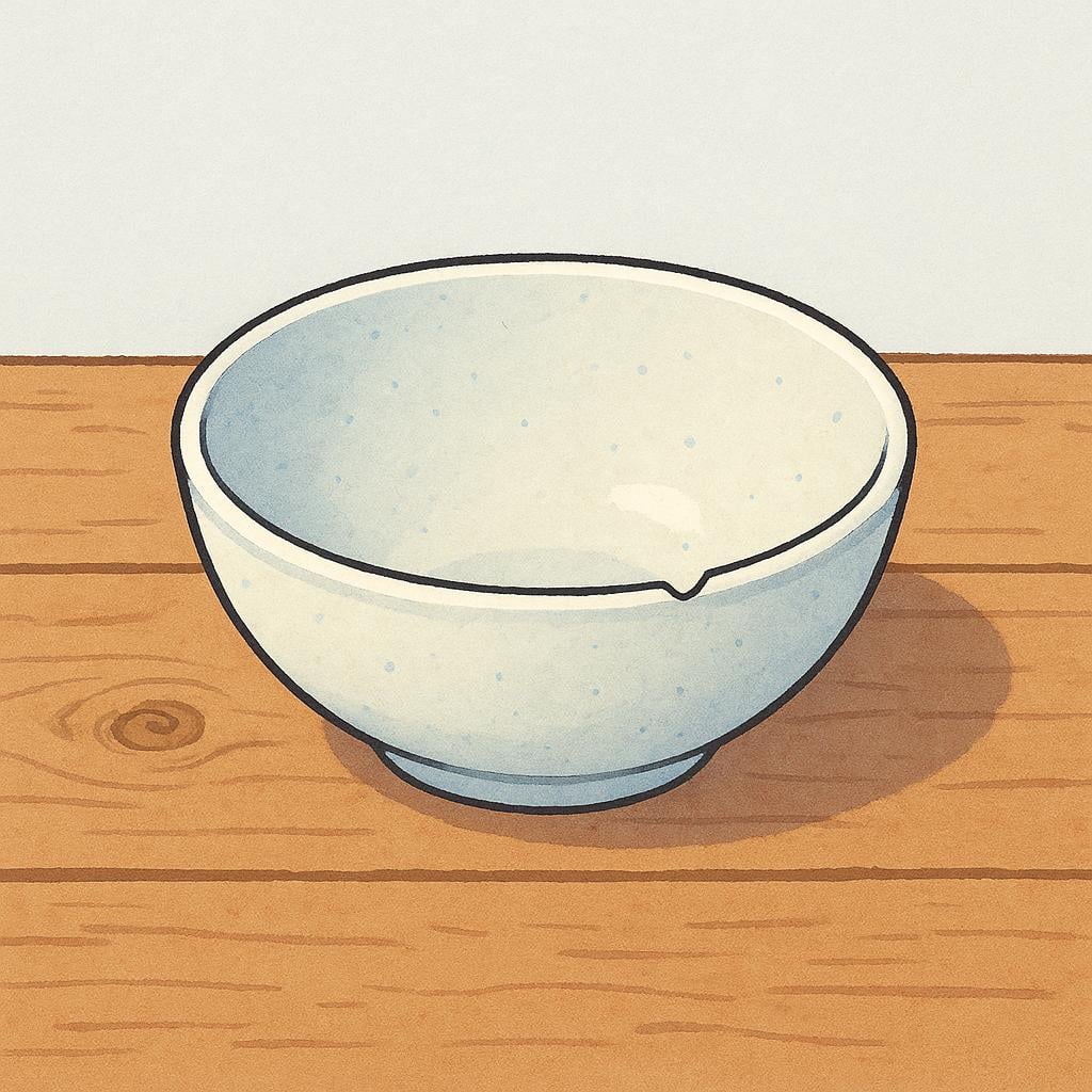 A simple, empty, chipped ceramic bowl resting on a plain wooden table, symbolizing a lack of food or resources.