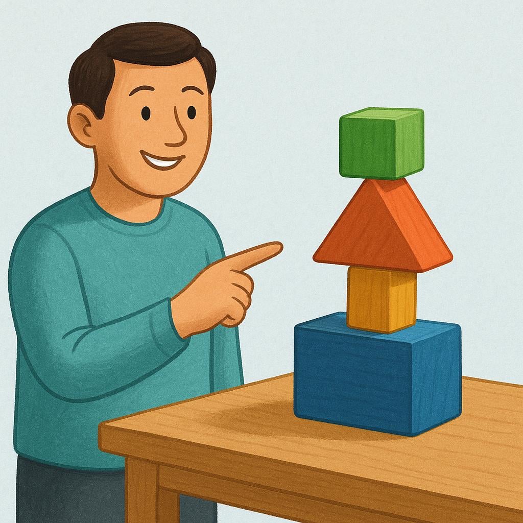 A person standing next to a perfectly balanced, stable structure made of three colorful geometric wooden blocks, pointing confidently at the structure.