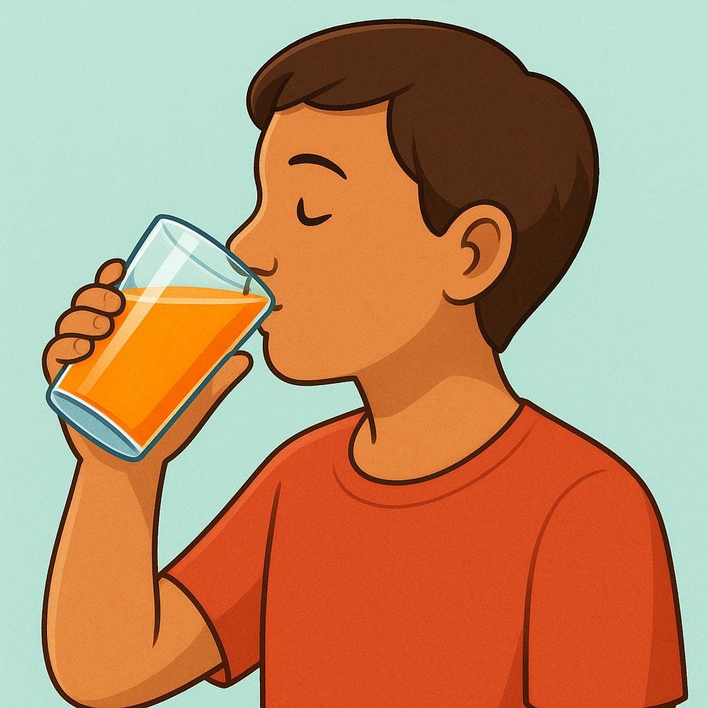 A person holding a clear glass filled with orange juice up to their mouth, actively drinking the liquid.