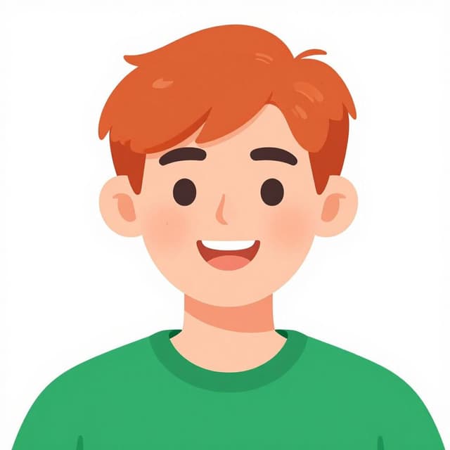 A portrait of a smiling person with bright red hair and a green shirt.
