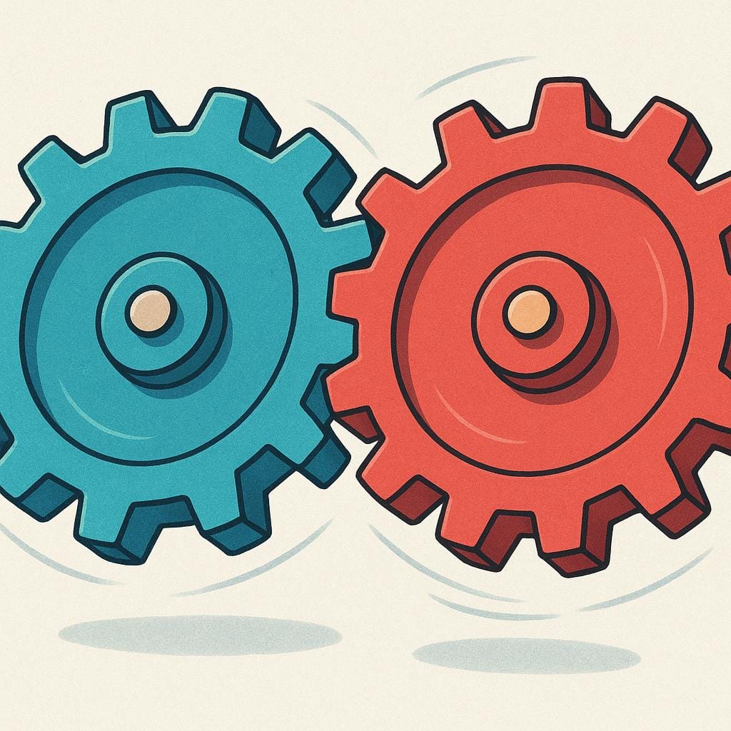 Una vista ravvicinata di due grandi ingranaggi meccanici, dai colori vivaci e interconnessi, che ruotano fluidamente.