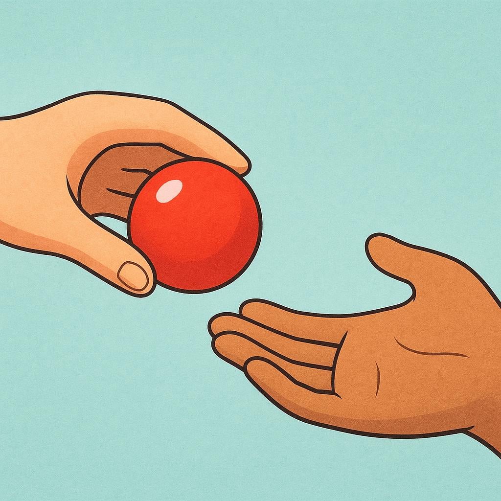 A close-up view of two hands. One hand holds a bright red ball and extends it toward the other, open receiving hand, illustrating the action of returning an item.