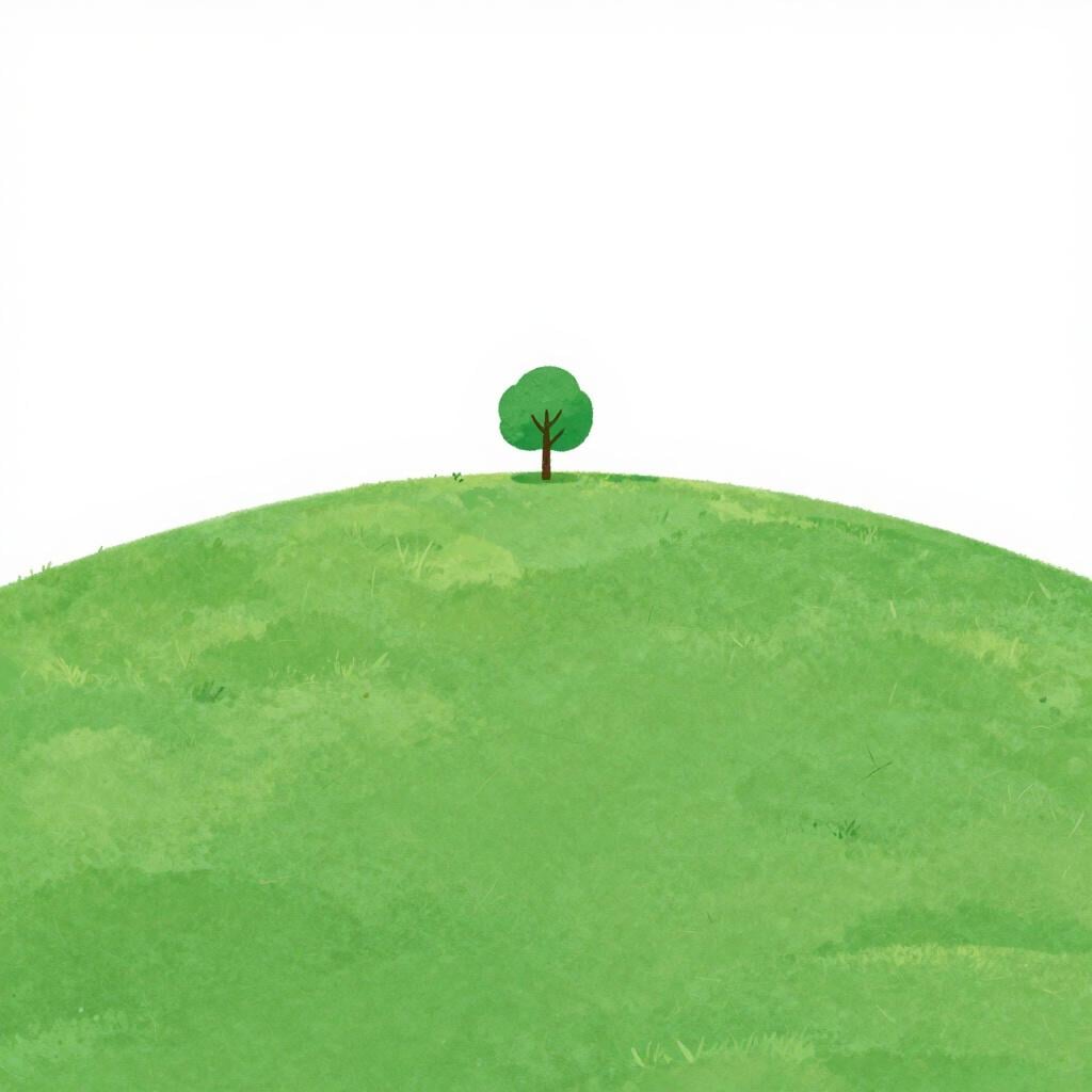 A tall, grassy hill rising above a flat landscape under a clear blue sky.