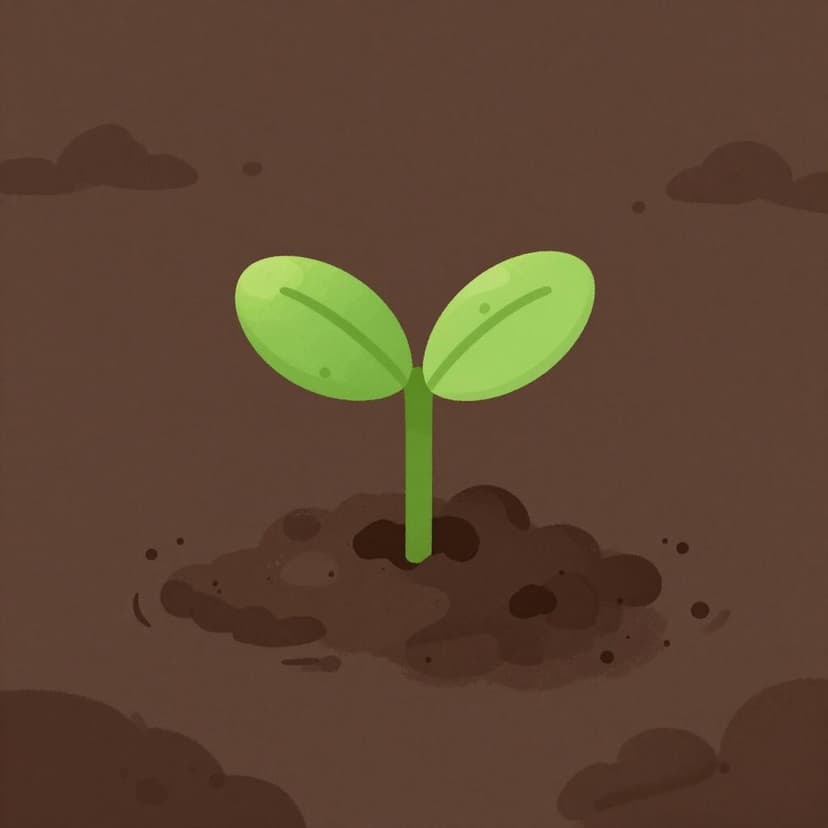 Ein winziger grüner Keimling bricht durch dunkle Erde ans Sonnenlicht.