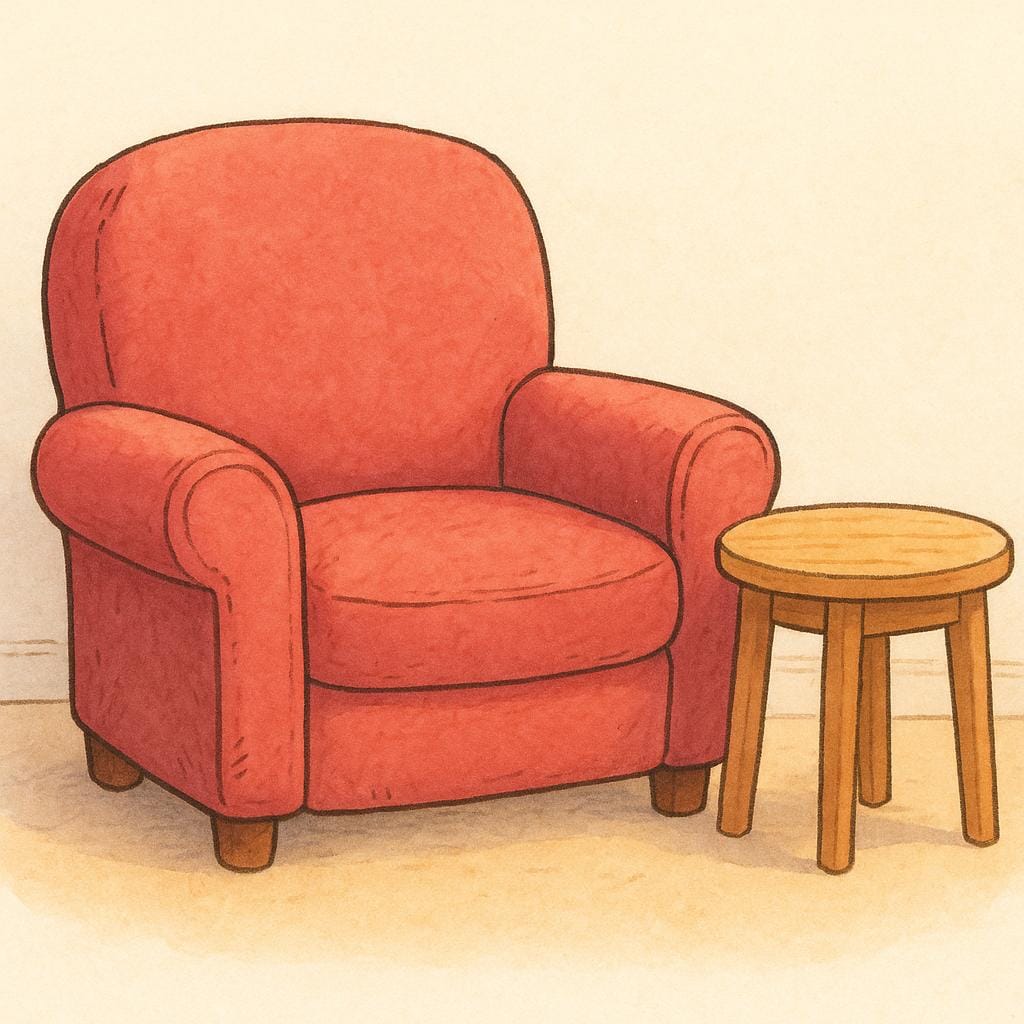 A cozy, well-worn armchair sitting in a brightly lit room, symbolizing familiarity.