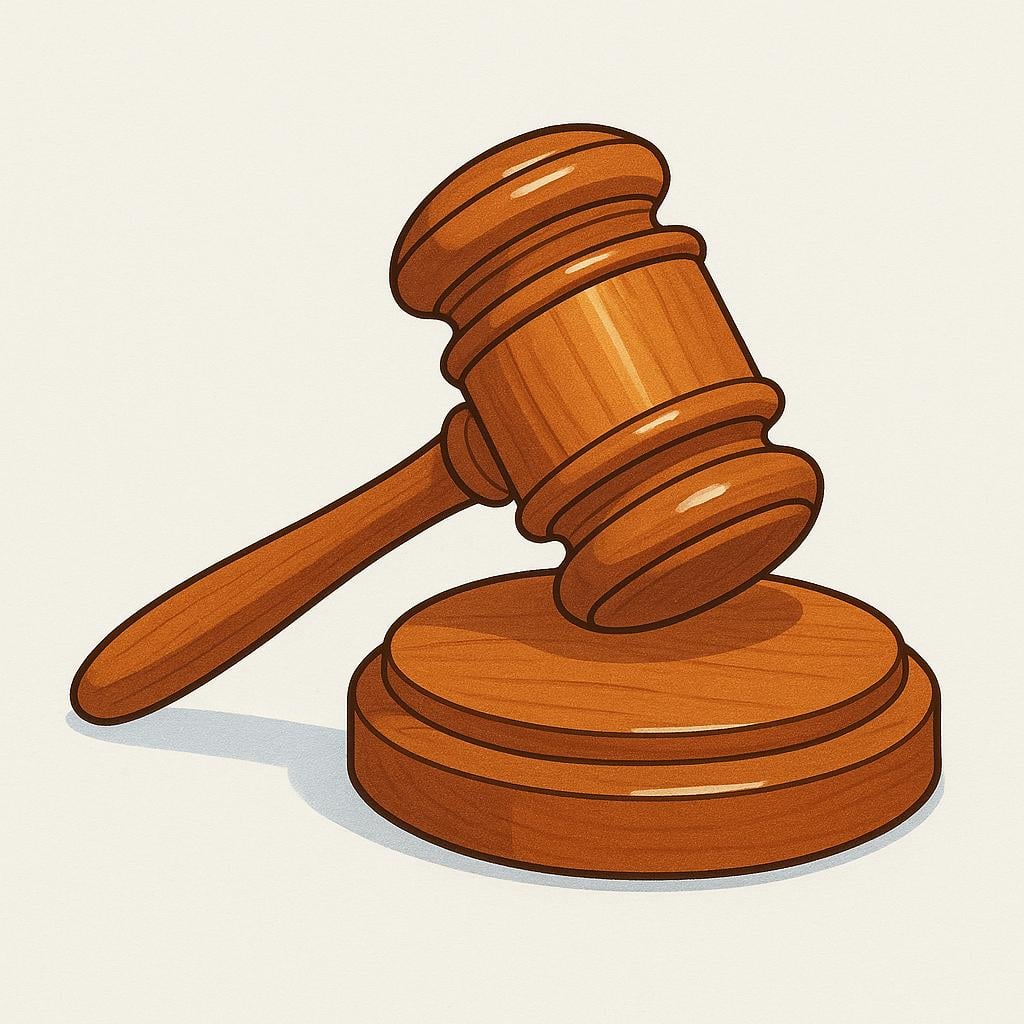 A colorful illustration of a wooden gavel resting on a wooden block.