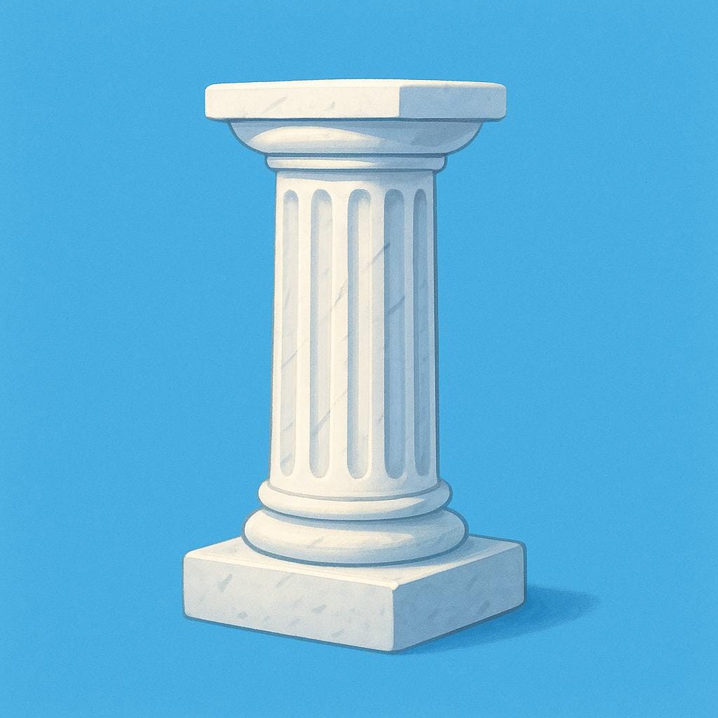A white marble ancient Greek column standing against a clear blue sky.