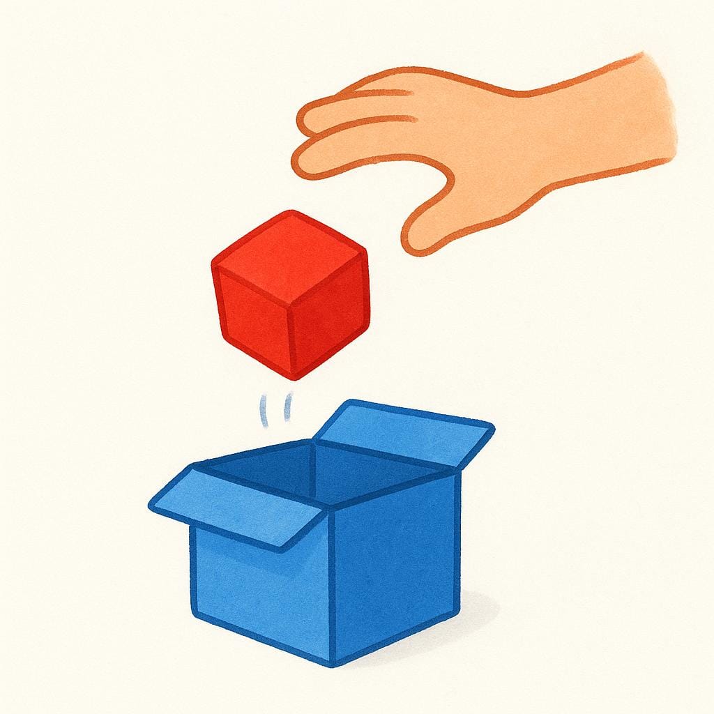 A simplified human hand actively dropping a bright red square block into an open blue box.