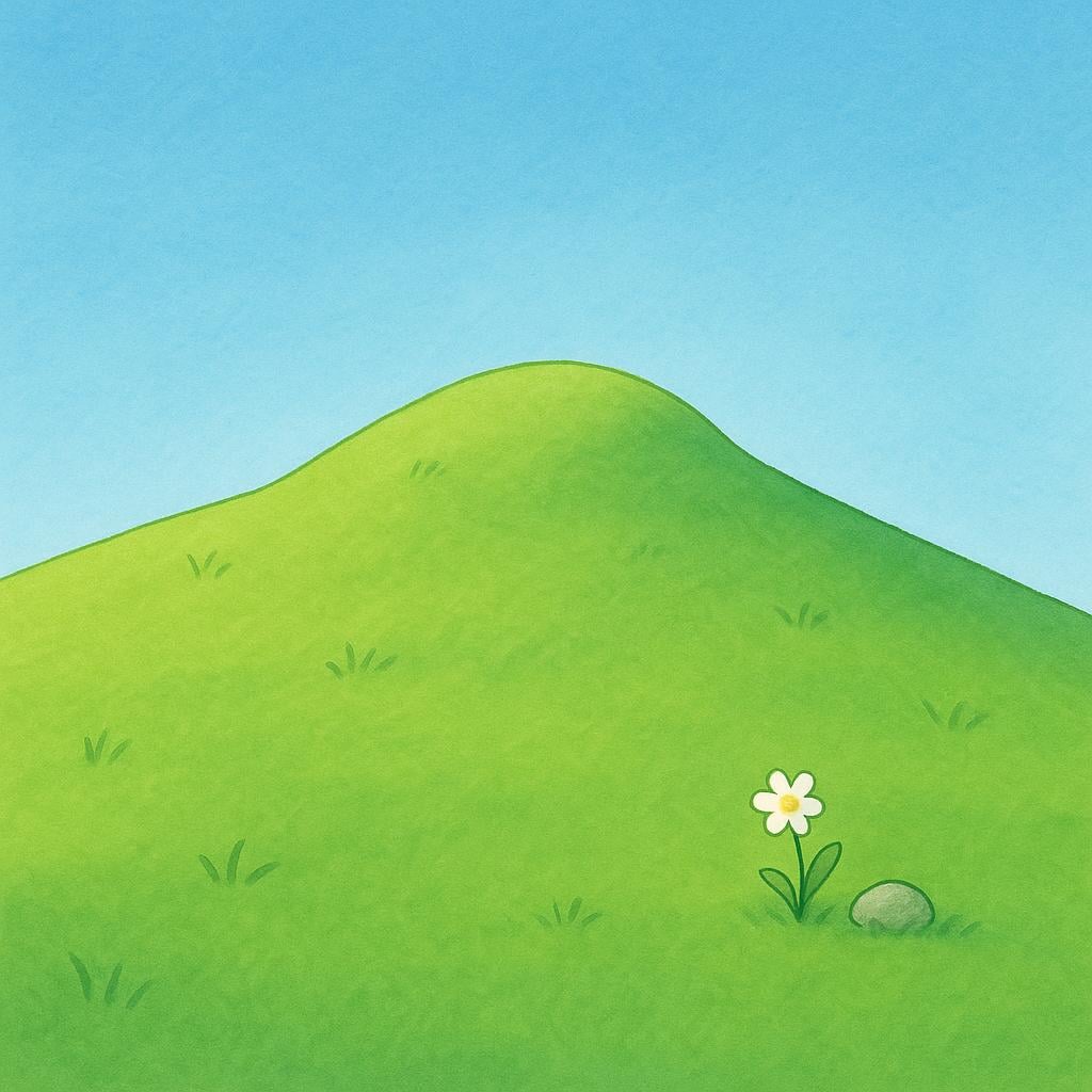 A smooth, gentle green grassy slope leading up the side of a small hill against a blue sky.