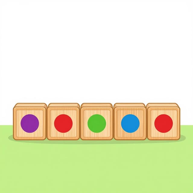 Uma fileira de blocos de brinquedo de madeira com círculos coloridos pintados neles em sequência.