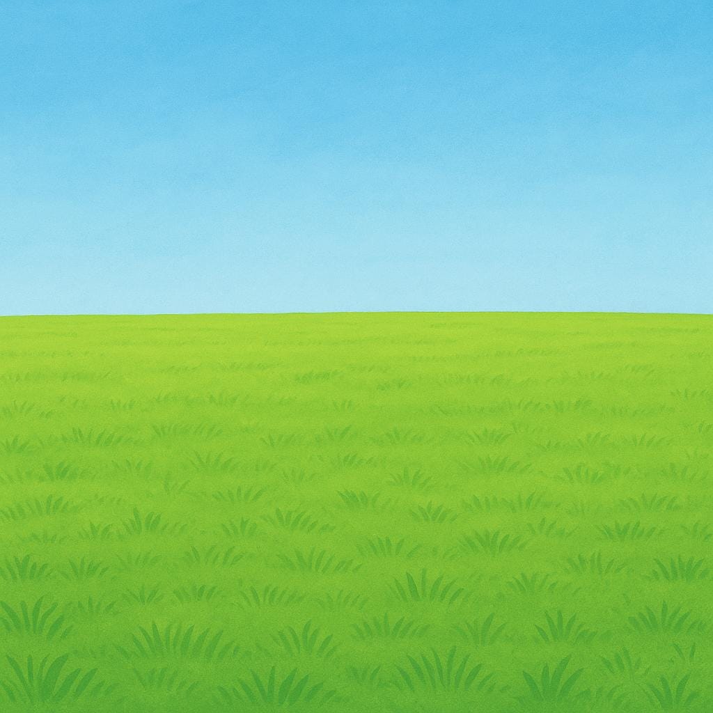A lush, bright green lawn filling the foreground under a clear blue sky.