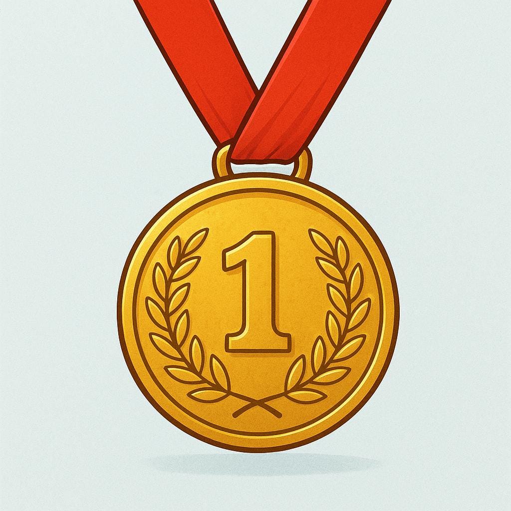 A brightly polished gold medal suspended from a red ribbon, symbolizing excellence and achievement.