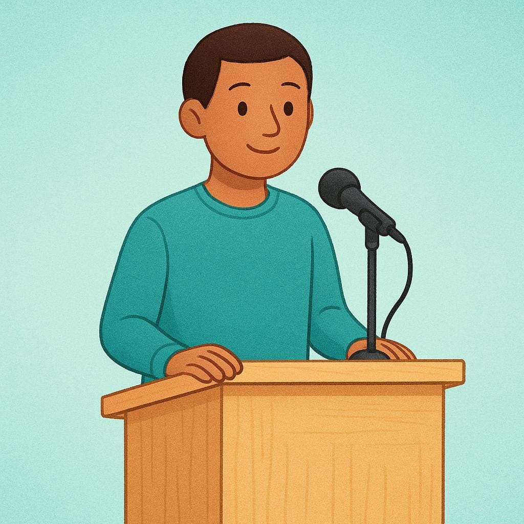 A person stands at a simple wooden podium, speaking into a black microphone, representing an official public statement.