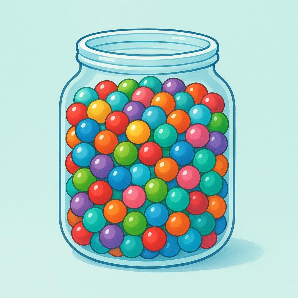A transparent glass jar that is completely full of colorful, small, polished marbles, illustrating maximum capacity.