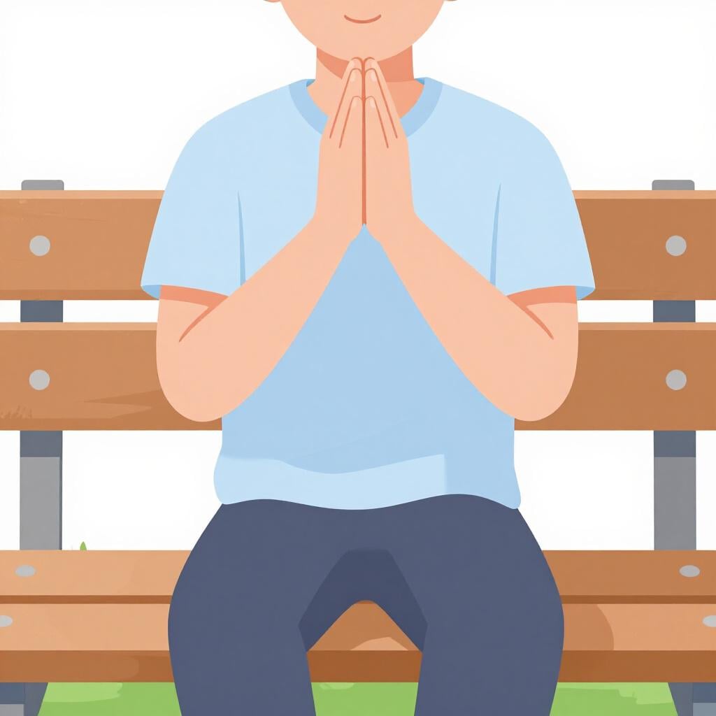 A person with hands folded in prayer.