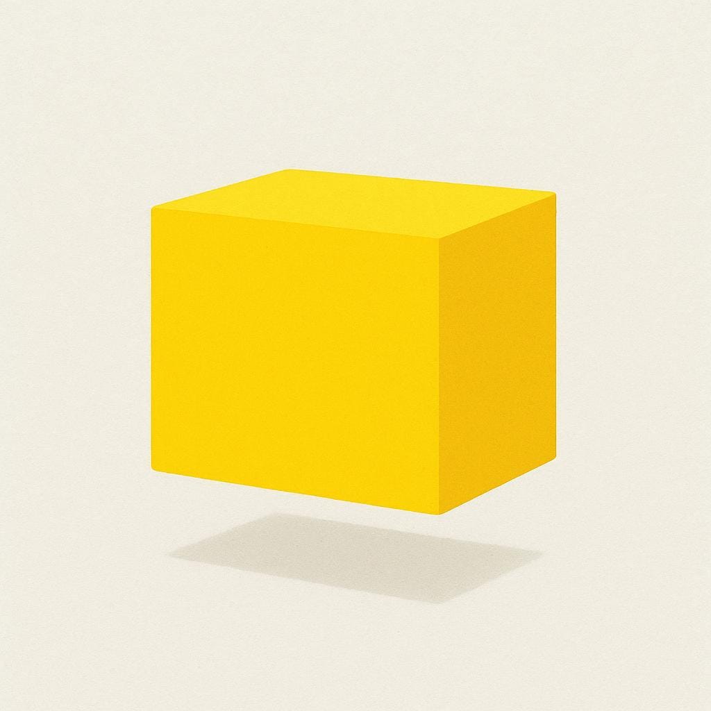 A large, solid, uniform rectangular block painted entirely in bright yellow, representing the color itself.