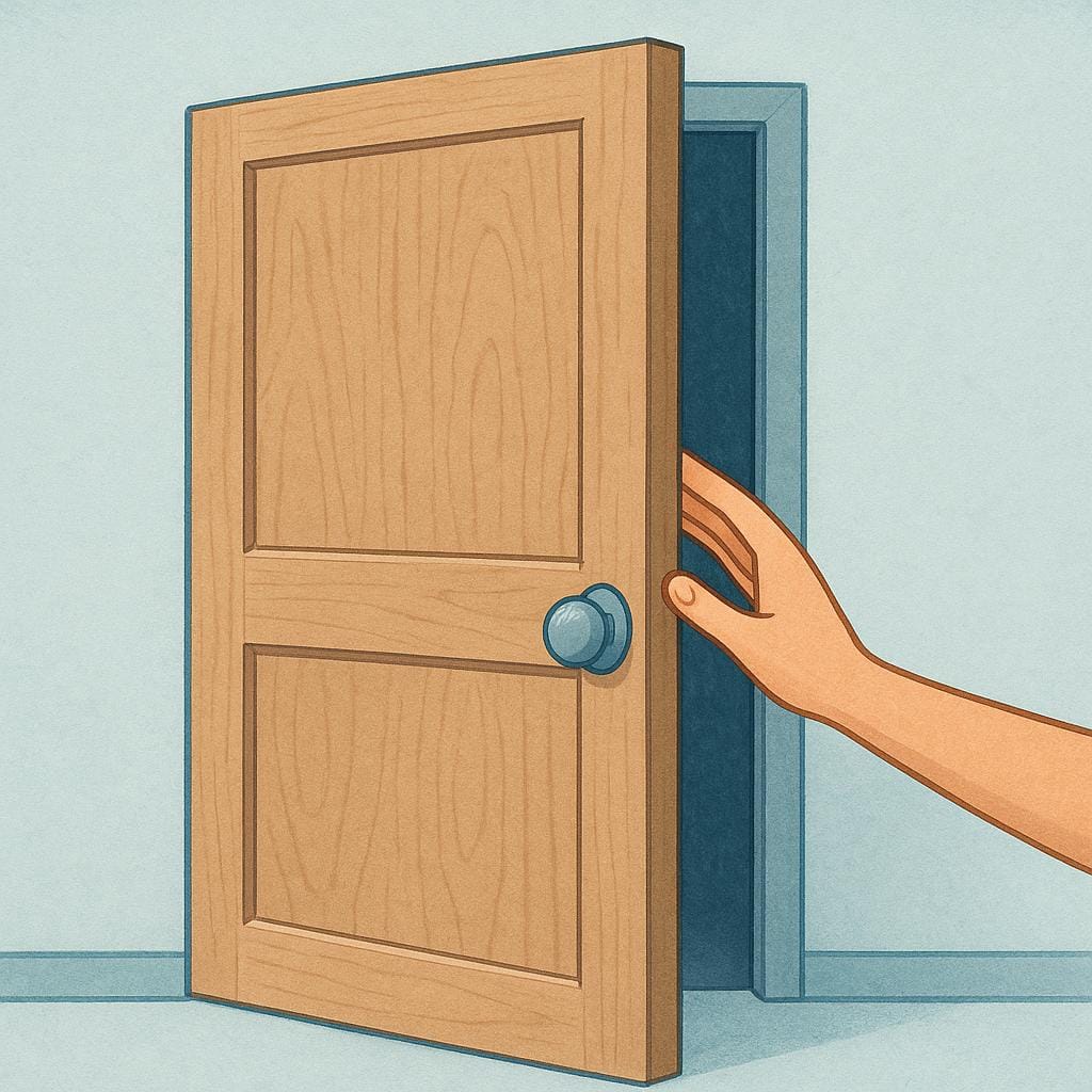 A human hand pushes open a simple brown wooden door, illustrating the command 'open'.