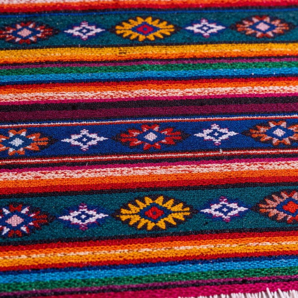 Un tessuto colorato con motivi tradizionali Maya dal Guatemala.