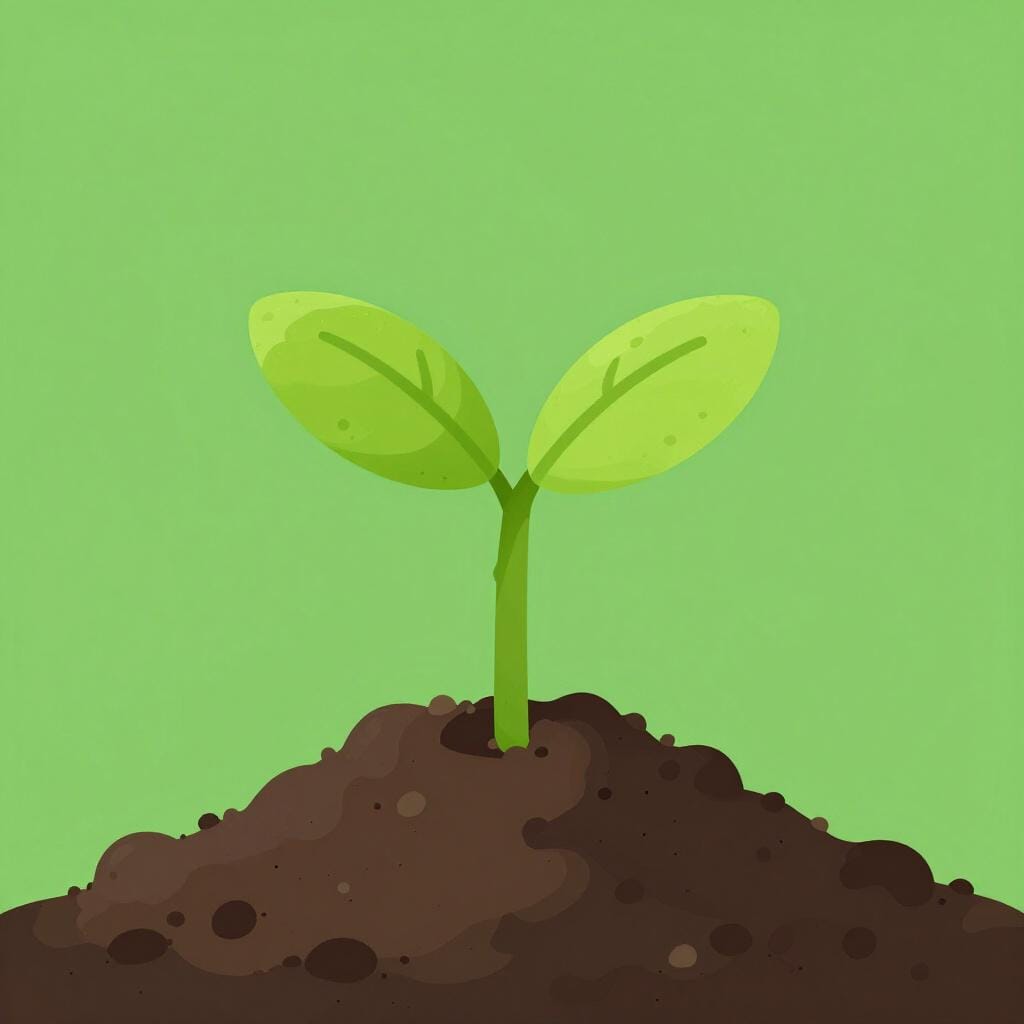 A small green sprout growing out of a pile of rich brown soil.