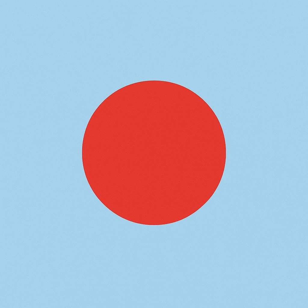 A large, simple red circle placed prominently in the foreground against a smooth, light blue background.