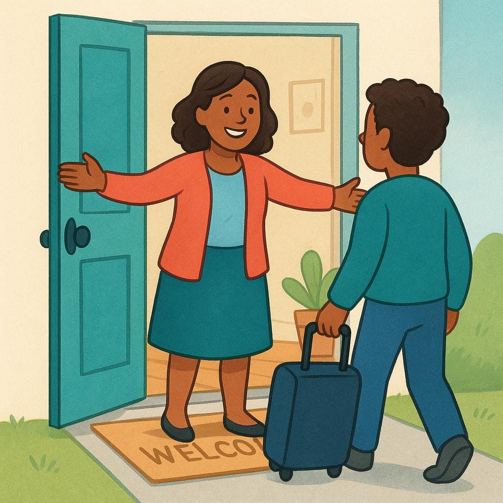 A smiling woman standing in an open doorway with her arms wide open, warmly greeting and receiving a person who is arriving.