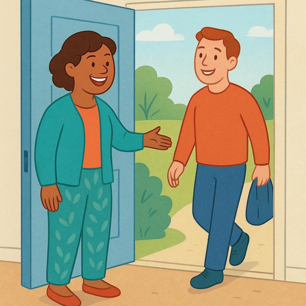 A person stands in an open doorway, smiling and extending an arm in a warm welcoming gesture toward a visitor.