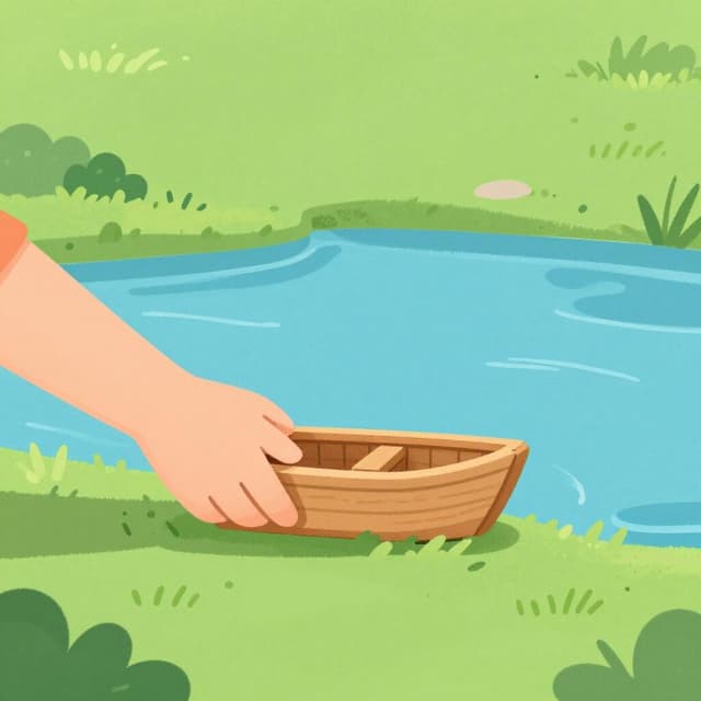 A hand gently pushing a small wooden toy boat away from a grassy shore into the center of a pond.