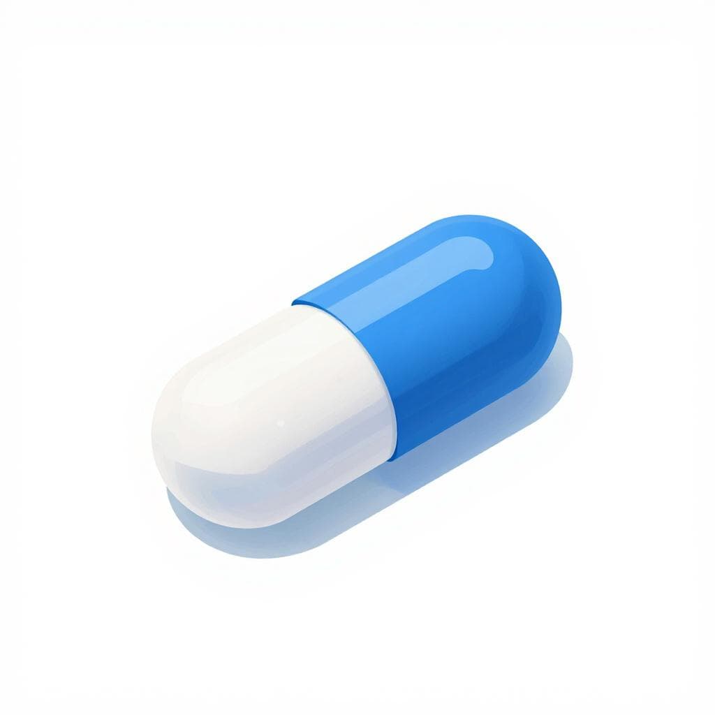 Une seule capsule de médicament ronde, bleue et blanche, reposant sur une surface blanche et propre.
