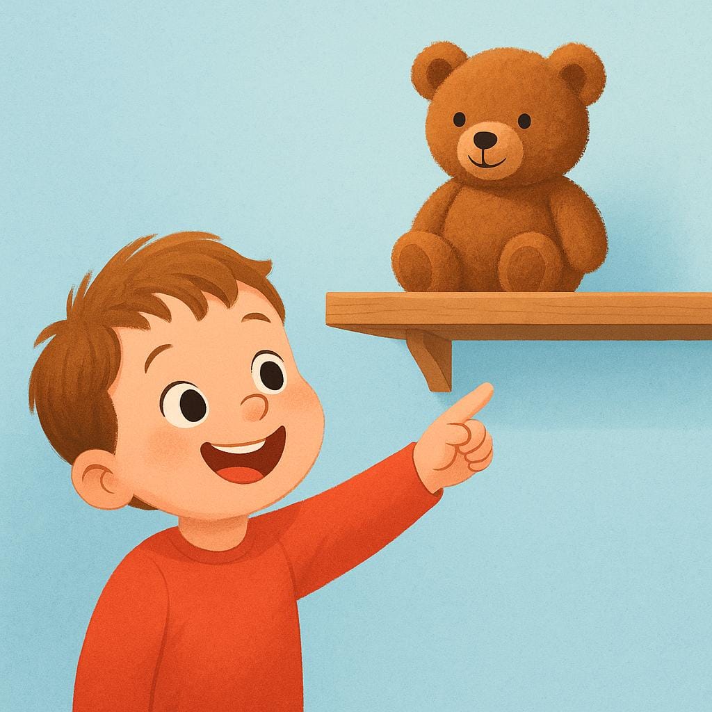 A delighted young child pointing excitedly at a fluffy brown teddy bear sitting on a high shelf, showing the moment of recognition.