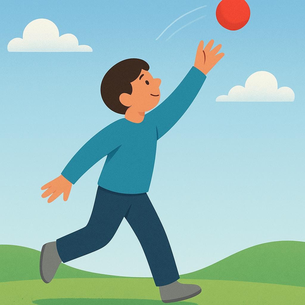 A person throws a small red ball high into the air against a bright blue background.